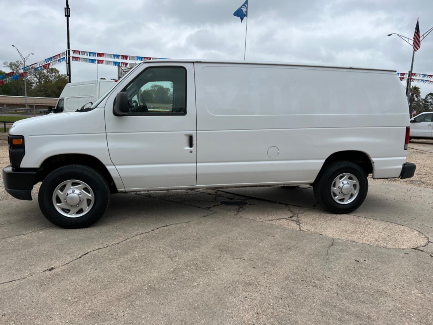 2012 White /Gray Ford E-Series Van (1FTNE2EL7CD) with an 5.4 V8 engine, Automatic transmission, located at 4520 Airline Hwy, Baton Rouge, LA, 70805, (225) 357-1497, 30.509325, -91.145432 - 2012 Ford E-250 Cargo Van 5.4 V8 Gas, 156K Miles, Power Windows & Locks, Shelves For Tools Or Parts. NO IN HOUSE FINANCING. FOR INFO PLEASE CONTACT JEFF AT 225 357-1497 CHECK OUT OUR A+ RATING WITH THE BETTER BUSINESS BUREAU WE HAVE BEEN A FAMILY OWNED AND OPERATED BUSINESS AT THE SAME LOCATION FOR - Photo#1